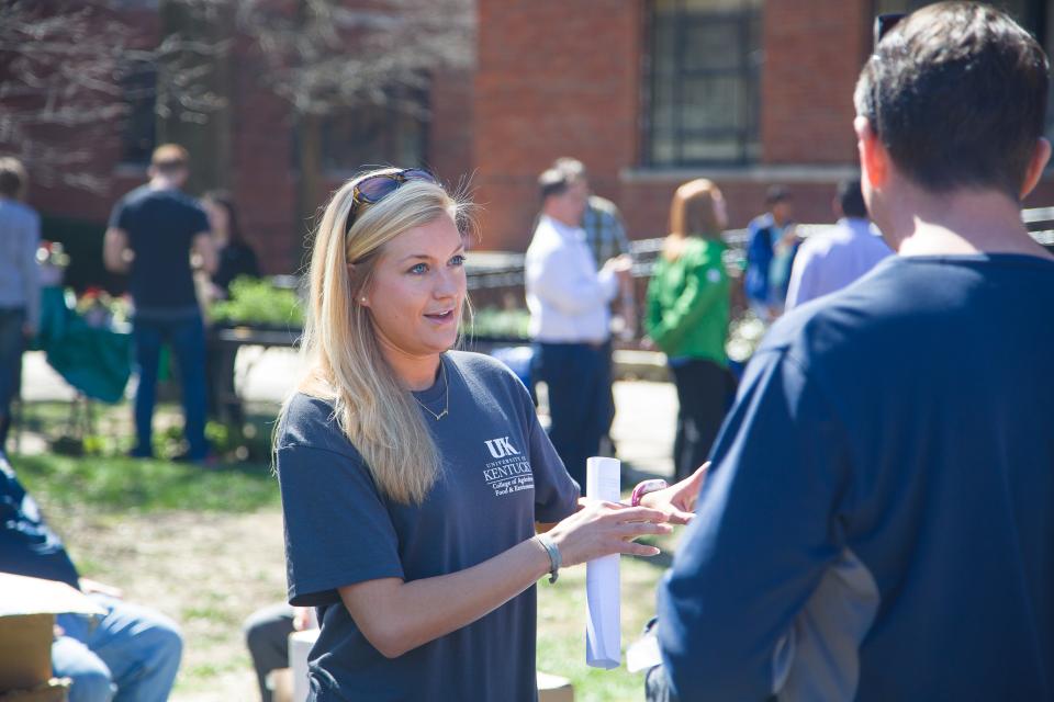 Students Outside on Campus Having a Conversation